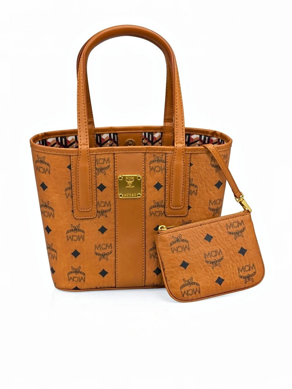 MCM small tote in cognac Like New